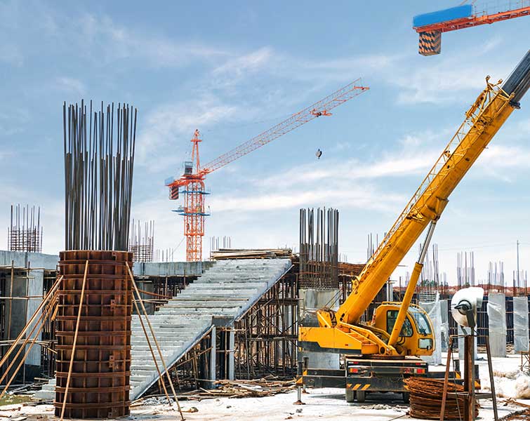 construction site with equipment protected by site security rental equipment